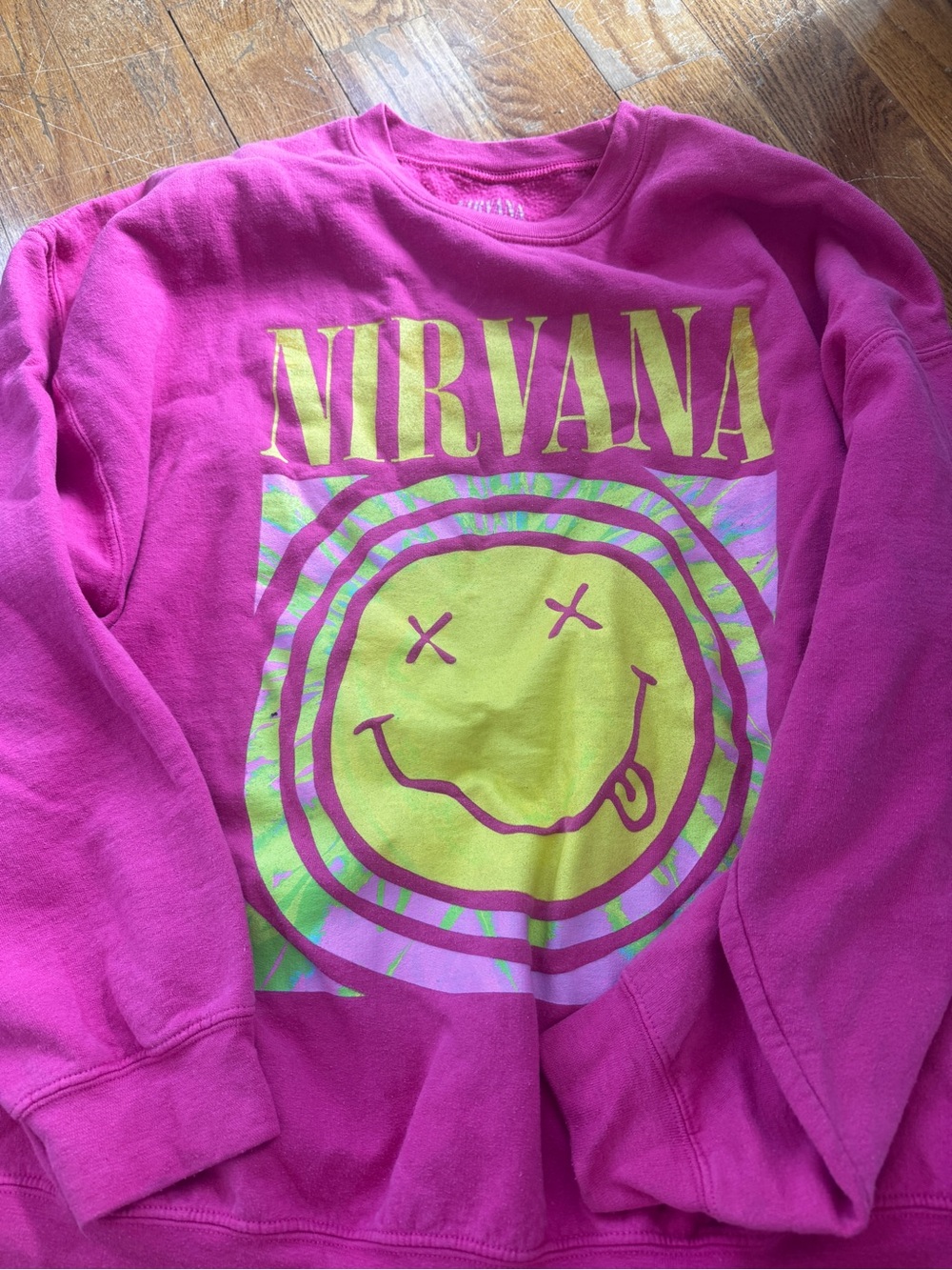 NIRVANA Pink Crewneck Sweatshirt with Yellow Smiley Graphic